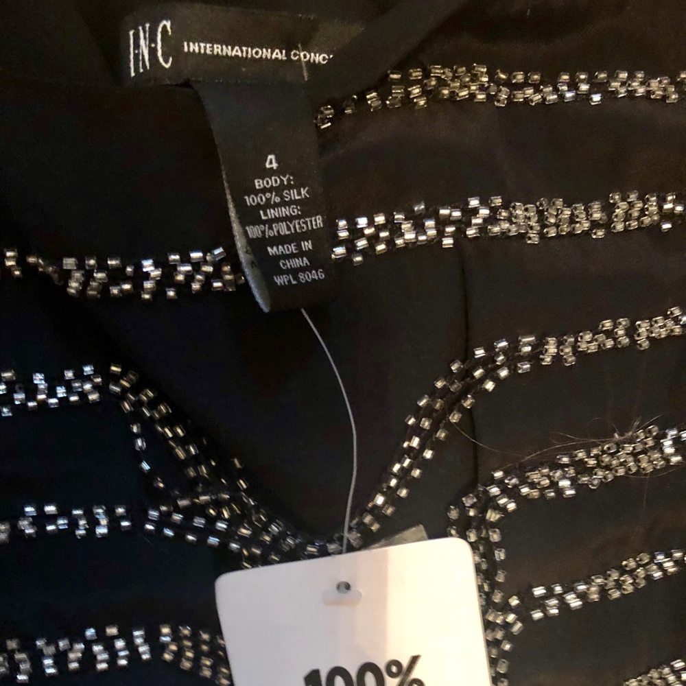 Brand new- Inc sold beaded dress.